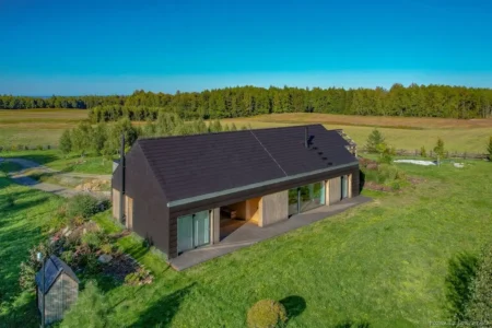 Perfekcyjnie gładki dach: elegancja w architekturze współczesnej Perfekcyjnie gładki dach